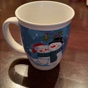 Snowmen under mistletoe coffee mug